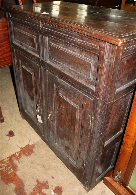 An early 18th century oak cupboard, W.3ft 4in. D.1ft 8in. H.3ft 4in.